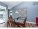 Dining room featuring modern decor and plenty of natural light at 19983 Midway Blvd, Port Charlotte, FL 33948
