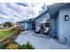 Inviting front porch with comfortable seating and decorative planters at 19983 Midway Blvd, Port Charlotte, FL 33948