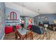 Open-concept living room and dining area with modern finishes at 19983 Midway Blvd, Port Charlotte, FL 33948