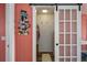 Walk-in closet featuring a barn door and built-in shelving and drawers at 19983 Midway Blvd, Port Charlotte, FL 33948