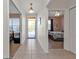 Bright hallway with access to bedrooms and balcony at 2002 Bal Harbor Blvd # 2421, Punta Gorda, FL 33950