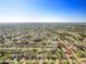 Aerial view showcasing the home's location in a residential area at 23071 Mineral Ave, Port Charlotte, FL 33954