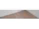 Light brown wood-look vinyl plank flooring at 2516 Crittendon St, North Port, FL 34286