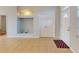 Spacious living room with tile flooring, storage, and ample natural light perfect for entertaining at 3097 Royal Palm Dr, North Port, FL 34288