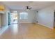 Bright living room featuring tile floors and neutral walls at 3097 Royal Palm Dr, North Port, FL 34288