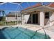 Screened-in pool and lanai area; great for entertaining and enjoying the outdoors at 3097 Royal Palm Dr, North Port, FL 34288