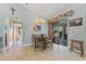 Charming dining area off the kitchen with lots of windows overlooking the pool at 3225 Antigua Dr, Punta Gorda, FL 33950