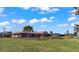 Landscaped backyard with privacy fence and canal view at 3310 Middletown St, Port Charlotte, FL 33952