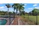 Landscaped backyard with fence at 3310 Middletown St, Port Charlotte, FL 33952