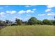 Spacious backyard with grassy area and water view at 3310 Middletown St, Port Charlotte, FL 33952