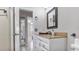 Bathroom with granite countertop and white vanity at 3310 Middletown St, Port Charlotte, FL 33952