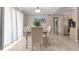 Elegant dining area with glass-top table and seating for six at 3310 Middletown St, Port Charlotte, FL 33952