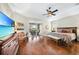 Large main bedroom with hardwood floors and sliding glass doors leading to a patio at 3824 Saint Girons Dr, Punta Gorda, FL 33950