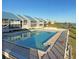 Inviting community pool with a view of the waterfront at 4410 Warren Ave # 118, Port Charlotte, FL 33953