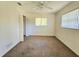 Spacious bedroom with carpet and ceiling fan at 6222 Berkeley St, Englewood, FL 34224