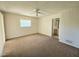 Main bedroom with en-suite bathroom access at 6222 Berkeley St, Englewood, FL 34224