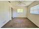 Spacious bedroom with carpet and ceiling fan at 6222 Berkeley St, Englewood, FL 34224