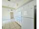 Bright kitchen features white appliances and ample counter space at 6222 Berkeley St, Englewood, FL 34224