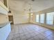 Bright and airy living room with tile flooring and ceiling fan at 6222 Berkeley St, Englewood, FL 34224