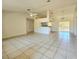 Spacious living room with tile floors and high ceilings at 6222 Berkeley St, Englewood, FL 34224