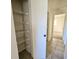 Walk-in pantry with wire shelving for convenient storage at 6222 Berkeley St, Englewood, FL 34224