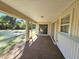 Relaxing screened porch overlooking backyard at 6222 Berkeley St, Englewood, FL 34224