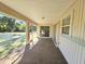 Spacious screened porch with access to backyard at 6222 Berkeley St, Englewood, FL 34224