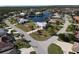 Aerial view of property showing canal front location and landscaping at 649 Maltese Dr, Punta Gorda, FL 33950