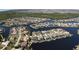 Aerial view showcasing a waterfront community with numerous homes and canals at 649 Maltese Dr, Punta Gorda, FL 33950