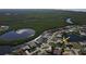 Aerial view of a home situated on a canal in a residential area at 649 Maltese Dr, Punta Gorda, FL 33950