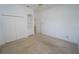 Spacious bedroom with double doors and built-in shelving at 649 Maltese Dr, Punta Gorda, FL 33950