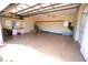 Spacious garage with an abundance of room for storage, work benches, and high ceiling at 649 Maltese Dr, Punta Gorda, FL 33950