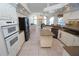 Well-appointed kitchen featuring an island and open views to the living area at 649 Maltese Dr, Punta Gorda, FL 33950