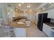 Gourmet kitchen with granite countertops, stainless steel appliances, and ample cabinet space at 649 Maltese Dr, Punta Gorda, FL 33950