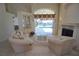 Comfortable living room featuring access to lanai, stylish furniture, and an airy, open layout at 649 Maltese Dr, Punta Gorda, FL 33950