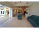 Open floor plan with access to the kitchen, breakfast nook, and screened-in pool area at 649 Maltese Dr, Punta Gorda, FL 33950