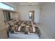 Large main bedroom leads to the main bathroom and features a spacious layout at 649 Maltese Dr, Punta Gorda, FL 33950