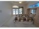 Relaxing main bedroom with access to outdoor pool area and plenty of sunlight at 649 Maltese Dr, Punta Gorda, FL 33950