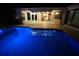 Night view of private swimming pool with blue lights at 649 Maltese Dr, Punta Gorda, FL 33950
