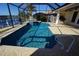 Inviting pool with spa and screened enclosure at 649 Maltese Dr, Punta Gorda, FL 33950