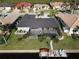 Aerial showcasing the home's large backyard, pool, and dock at 726 Macedonia Dr, Punta Gorda, FL 33950