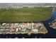 Aerial view showcasing the property's waterfront location and neighborhood at 726 Macedonia Dr, Punta Gorda, FL 33950