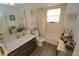 Guest bathroom with bathtub and modern finishes at 726 Macedonia Dr, Punta Gorda, FL 33950