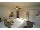 Second bedroom with queen-size bed and built-in shelving at 726 Macedonia Dr, Punta Gorda, FL 33950