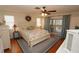 King-size bed in a well-lit bedroom with patio access at 726 Macedonia Dr, Punta Gorda, FL 33950