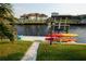 Private dock with kayaks and access to the canal at 726 Macedonia Dr, Punta Gorda, FL 33950