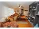 Comfortable living room featuring hardwood floors and built-in shelving at 726 Macedonia Dr, Punta Gorda, FL 33950