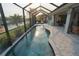 Enjoy this heated pool with screened enclosure and spa at 726 Macedonia Dr, Punta Gorda, FL 33950