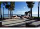 Scenic waterfront park with palm trees and benches, offering a relaxing atmosphere at 726 Macedonia Dr, Punta Gorda, FL 33950