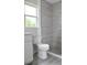 Clean bathroom with a shower, toilet, and white vanity at 11278 4Th Ave, Punta Gorda, FL 33955
